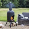 large powder-coated steel chimenea in a matt graphite