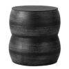 round black metal drum shaped side table with textured boho design