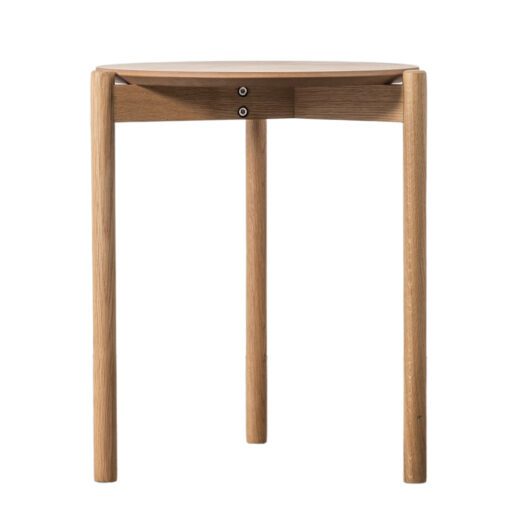 simple round oak side table with rounded legs framing the table top