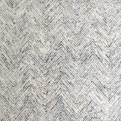 rectangular cream rug with an inky blue all over chevron pattern