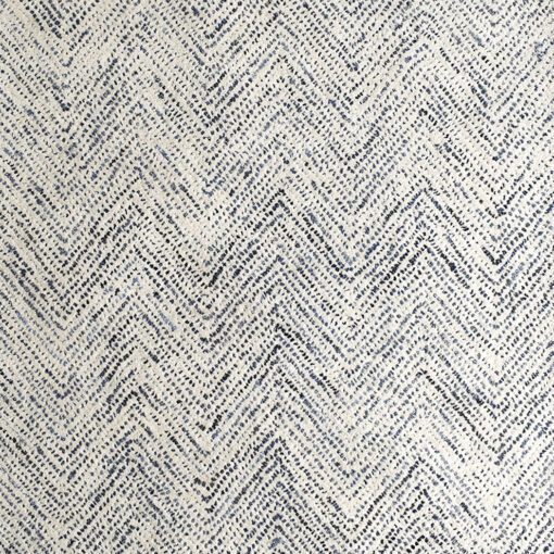 rectangular cream rug with an inky blue all over chevron pattern