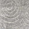 rectangular cream rug with a striking inky grey swirly starburst design
