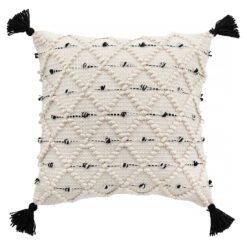 square boho cushion with a loose cream weave and contrasting black stithing, textured diamond patterning and black corner pom poms