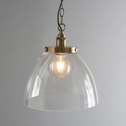 large domed glass vintage style pendant light with retro style fittings and black textured industrial cord