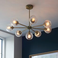 eight arm antique brass pendant light with clear glass fluted shades