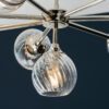eight arm shiny nickel pendant light with clear glass fluted shades