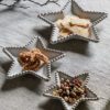 set of three star shaped shallow plates with a natural glaze and beaded edging