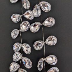 decorative jewel garland with teardrop shaped clear crystals with a reflective silver mirror backing attached to silver wire