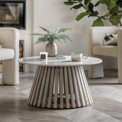 round coffee table with a tapered slatted wooden base finished in a sand blasted white wash and completed with a white Indian marble table top