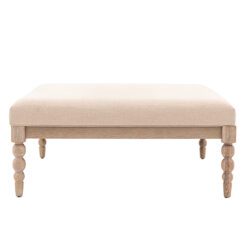handcrafted square oak coffee table with bobbin turned legs and a natural upholstered top
