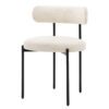 set of two contemporary round dining chairs upholstered in a textured cream fabric with a curved back and black metal frame