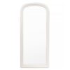 full length wooden mirror with a stone white painted finish, arched top and beaded detailing