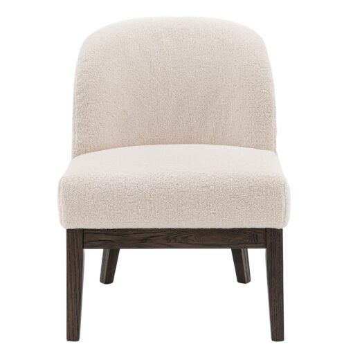 small oak framed occasional chair with a curved back upholstered in a cosy textured cream fabric