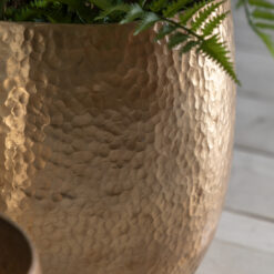 set of two large gold metal planters with a hammered finish