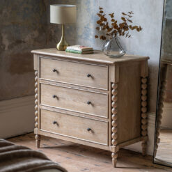 oak three drawer chest with elegant bobbin corner detailing, a subtle lime wash and small round knobs