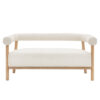 contemporary sofa with a simple wooden frame crafted from ash with distinct curved shaping and upholstered textured cream boucle seat and backing