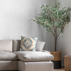 large artificial green potted olive tree