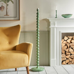 stick metal floor lamp base with bobbin detailing finished in a fresh green palette and matching fabric cord