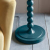 stick metal floor lamp base with bobbin detailing finished in a deep teal blue and matching fabric cord