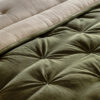 luxurious olive green velvet bedspread with a pintucked quilted design and natural cotton and linen blend reverse