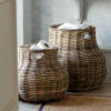 set of two round natural rattan storage baskets with integrated handles