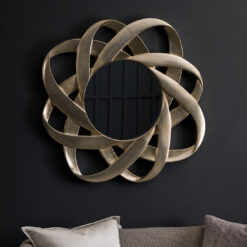 striking flower shaped decorative round wall mirror finished in a warm silver leaf