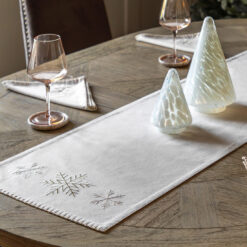 natural cream christmas table runner with gold embroidered snowflakes and blanket stitch edging