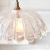 elegant clear glass shade with softly scalloped form for a timeless, classic look