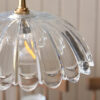elegant clear glass shade with softly scalloped form for a timeless, classic look