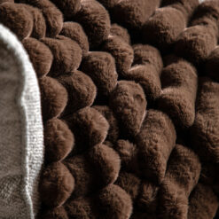 soft, luxurious, faux fur chunky throw with a ribbed design in a deep chocolate brown